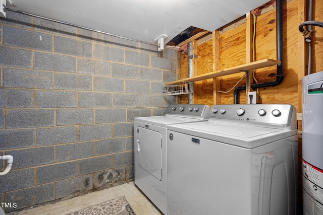 washroom featuring independent washer and dryer and water heater