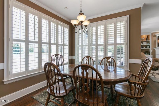 11270 Old Bailey Hwy, Wilson, NC 27896 - dining room with healthy amount of natural light, wood finished floors, a chandelier, and ornamental molding