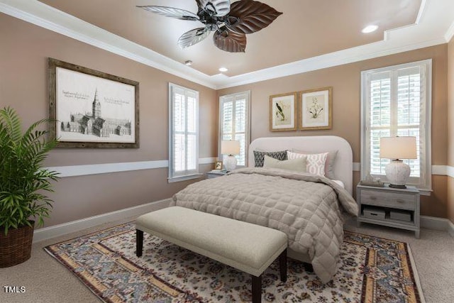 bedroom featuring carpet flooring, multiple windows, and ceiling fan