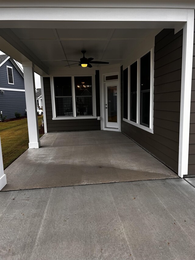 property entrance with ceiling fan