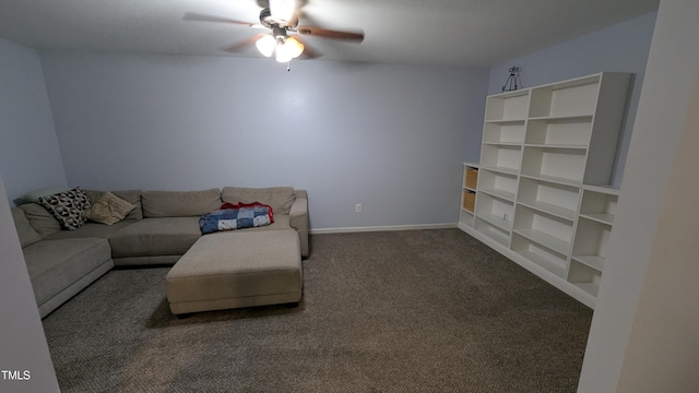 carpeted living area with baseboards and ceiling fan