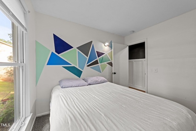 6125 Bellow St, Raleigh, NC 27609 - bedroom featuring carpet and baseboards