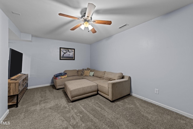 6125 Bellow St, Raleigh, NC 27609 - carpeted living area featuring ceiling fan and baseboards
