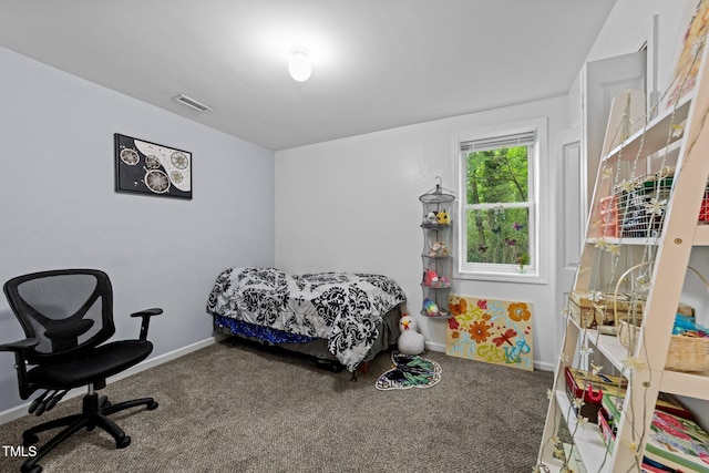 6125 Bellow St, Raleigh, NC 27609 - carpeted bedroom featuring baseboards