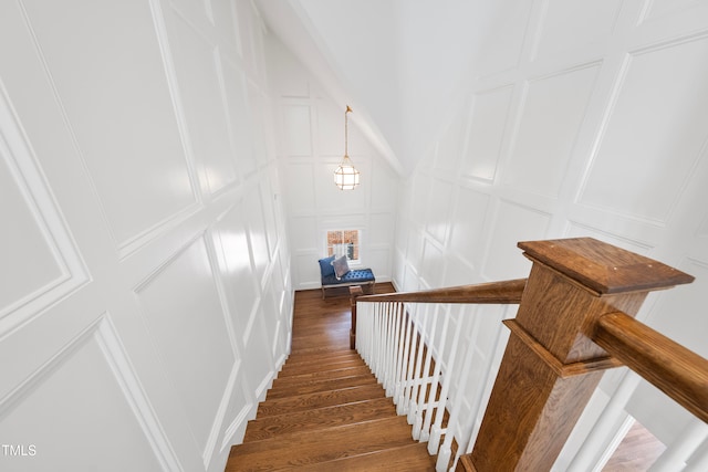 staircase featuring hardwood / wood-style flooring