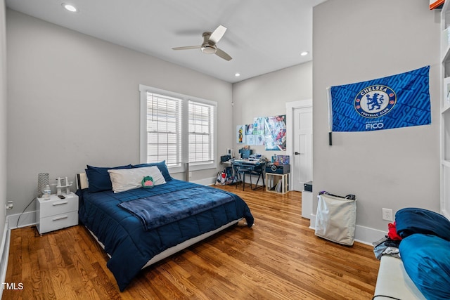 bedroom featuring ceiling fan and hardwood / wood-style floors