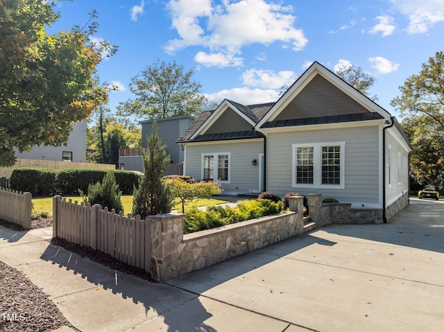 view of front of house with a patio area