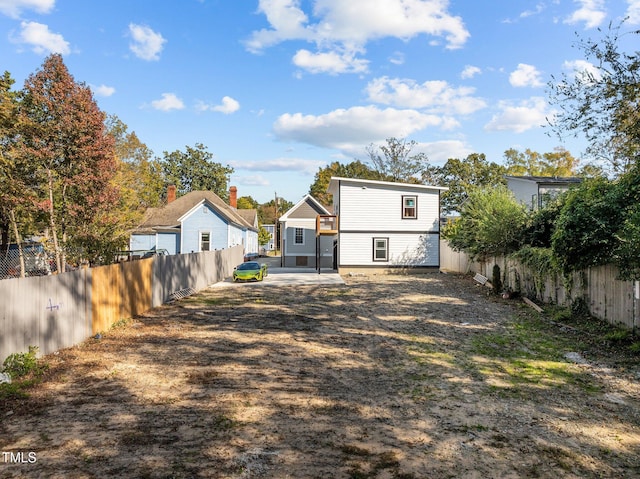 back of house with a patio area