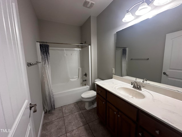 full bathroom featuring tile patterned floors, toilet, shower / bathtub combination with curtain, and vanity