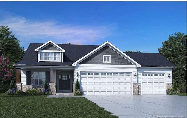 craftsman inspired home featuring a garage and a lawn