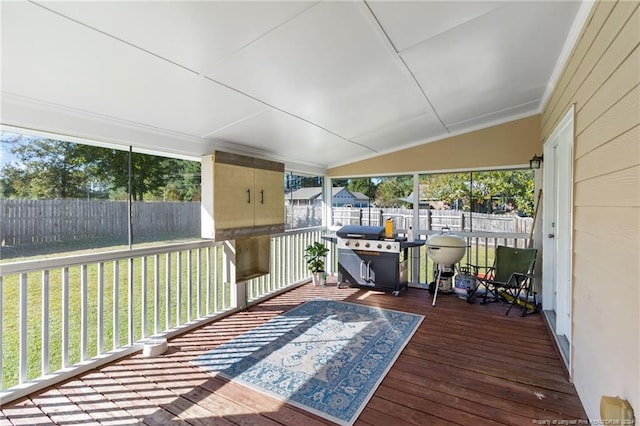 sunroom / solarium with lofted ceiling