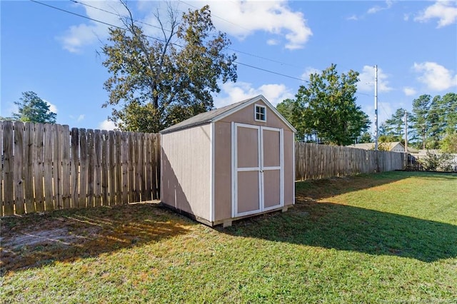 view of outdoor structure featuring a yard