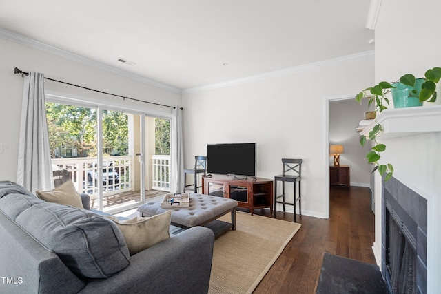 living room featuring crown molding and dark hardwood / wood-style floors