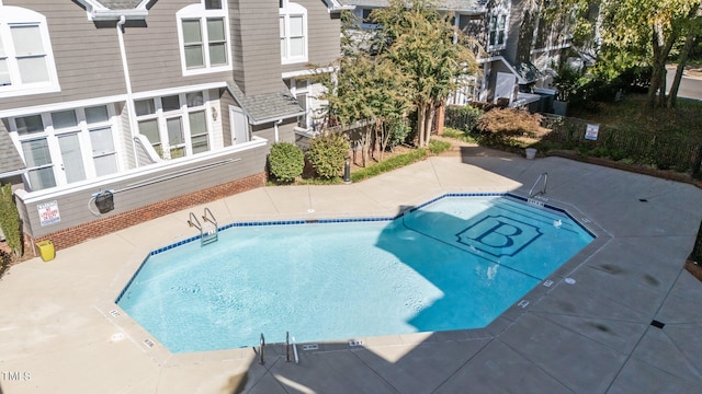 view of pool with a patio area