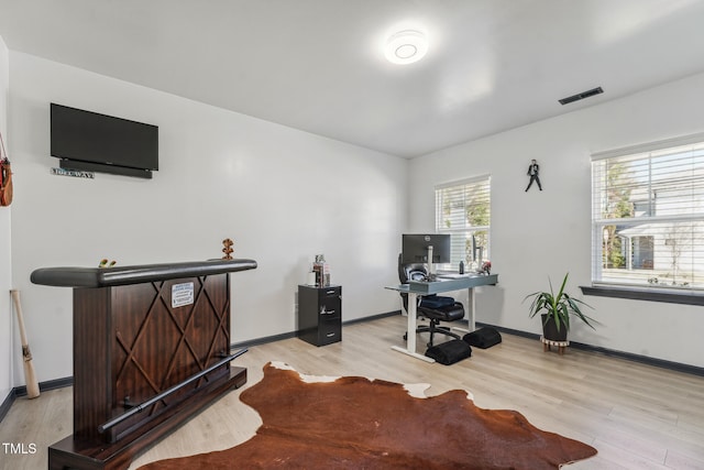 home office featuring light wood-type flooring