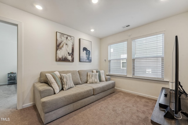 living room with light colored carpet