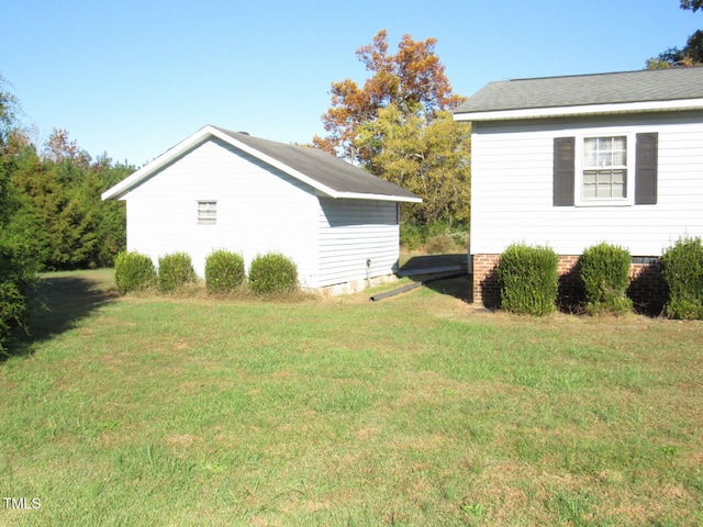 view of home's exterior featuring a lawn