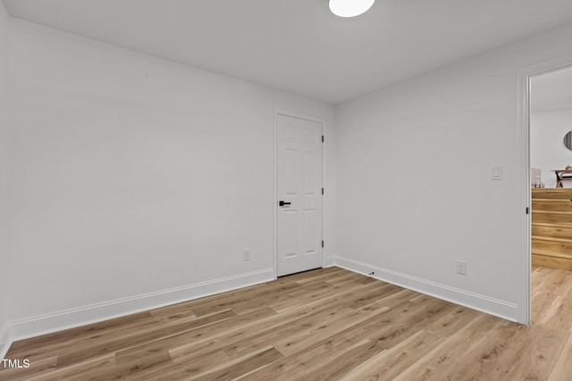 unfurnished room featuring light wood-type flooring