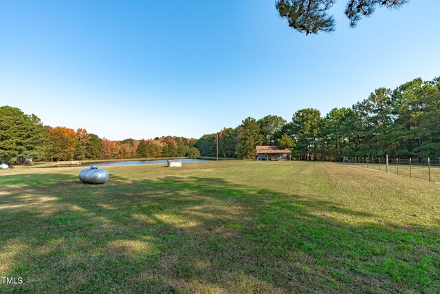 435 Tant Rd, Zebulon, NC 27597 - view of yard featuring a wooded view and a water view
