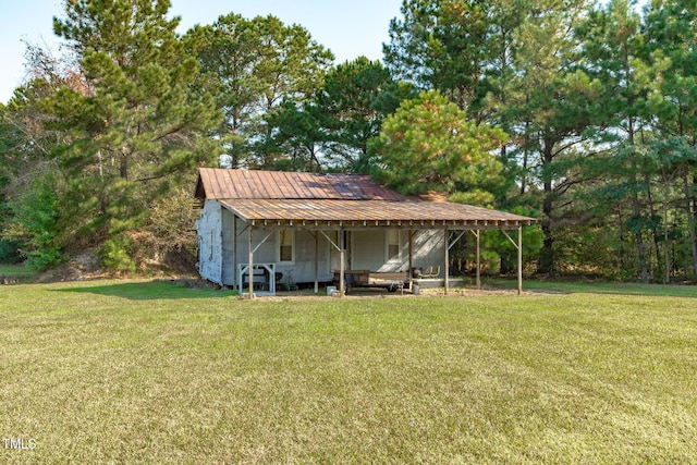 435 Tant Rd, Zebulon, NC 27597 - view of outdoor structure featuring a carport and an outdoor structure