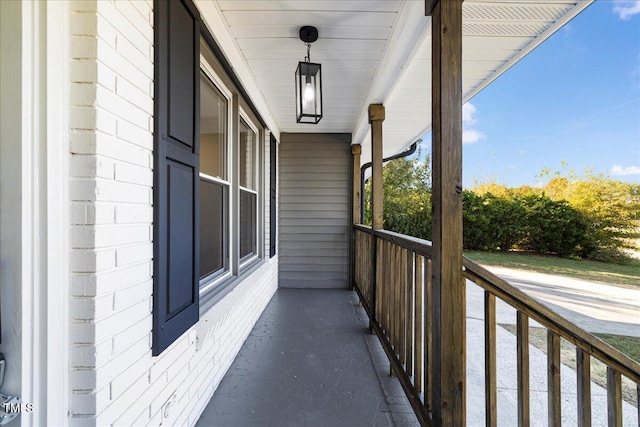 balcony featuring a porch