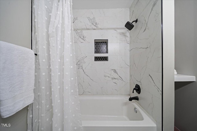 bathroom featuring shower / bathtub combination with curtain