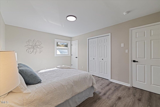 bedroom featuring hardwood / wood-style flooring