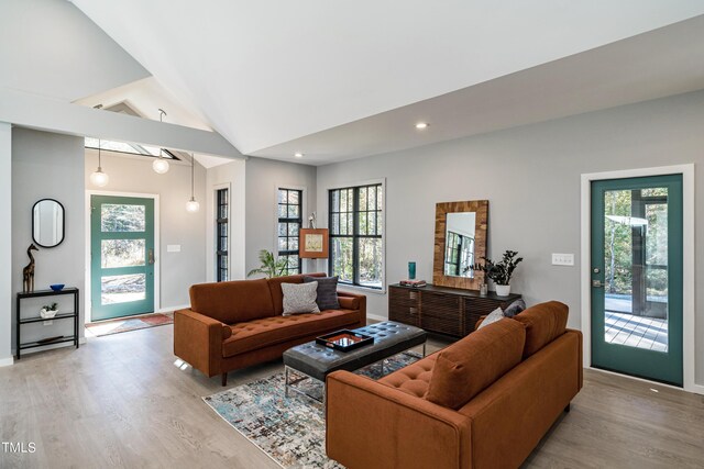 1414 Whippoorwill Ln, Chapel Hill, NC 27517 - living room with light wood-style flooring, lofted ceiling, baseboards, and recessed lighting