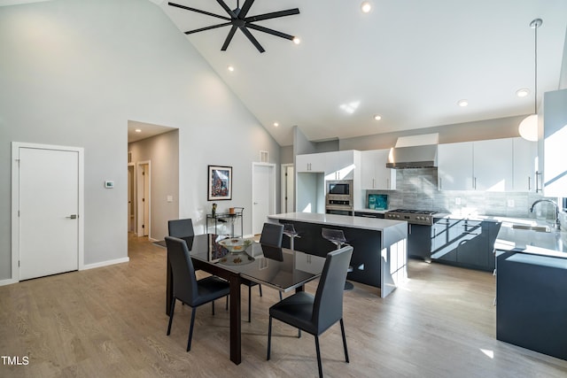 1414 Whippoorwill Ln, Chapel Hill, NC 27517 - dining space featuring high vaulted ceiling, ceiling fan, light wood-style flooring, recessed lighting, and baseboards