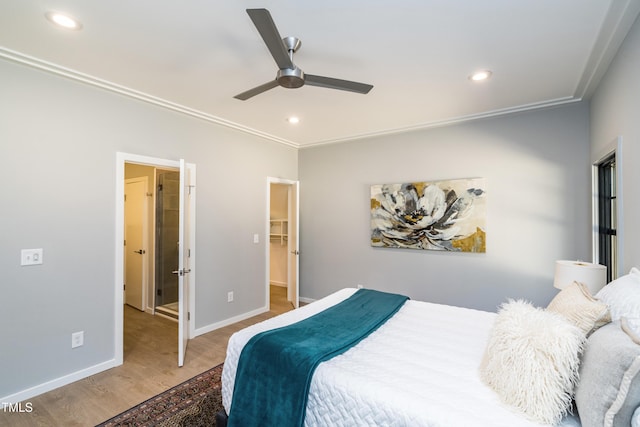 1414 Whippoorwill Ln, Chapel Hill, NC 27517 - bedroom featuring wood finished floors, recessed lighting, baseboards, a spacious closet, and ceiling fan