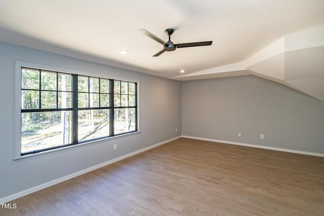 1414 Whippoorwill Ln, Chapel Hill, NC 27517 - spare room with a ceiling fan, wood finished floors, recessed lighting, baseboards, and vaulted ceiling
