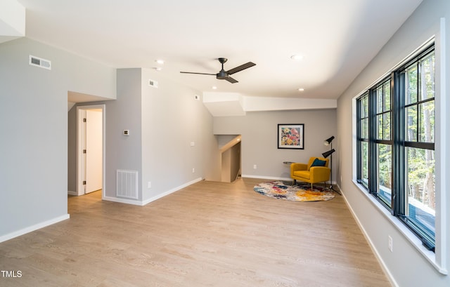 1414 Whippoorwill Ln, Chapel Hill, NC 27517 - sitting room with light wood-type flooring, ceiling fan, recessed lighting, vaulted ceiling, and baseboards