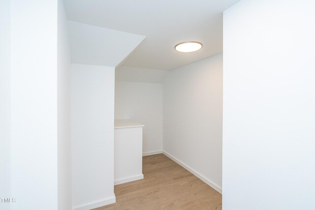 1414 Whippoorwill Ln, Chapel Hill, NC 27517 - hallway featuring light wood-style floors and baseboards