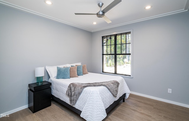 1414 Whippoorwill Ln, Chapel Hill, NC 27517 - bedroom with baseboards, wood finished floors, recessed lighting, crown molding, and ceiling fan