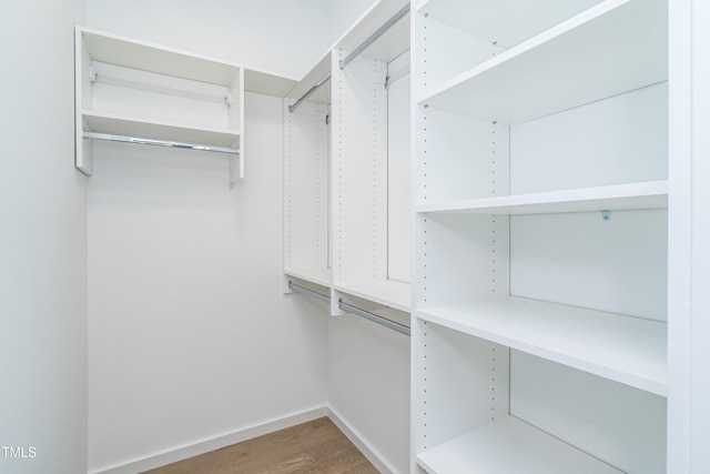 1414 Whippoorwill Ln, Chapel Hill, NC 27517 - walk in closet with wood finished floors