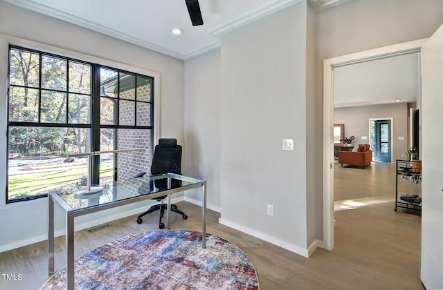 1414 Whippoorwill Ln, Chapel Hill, NC 27517 - home office with crown molding, ceiling fan, baseboards, and wood finished floors