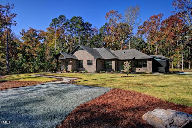 1414 Whippoorwill Ln, Chapel Hill, NC 27517 - view of front facade with a front yard