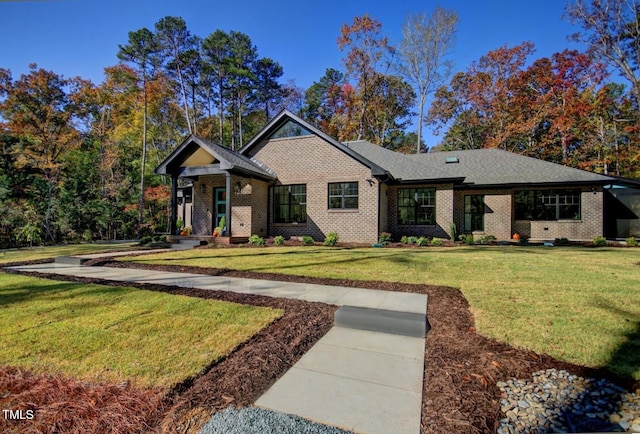 1414 Whippoorwill Ln, Chapel Hill, NC 27517 - view of front of house featuring brick siding and a front lawn