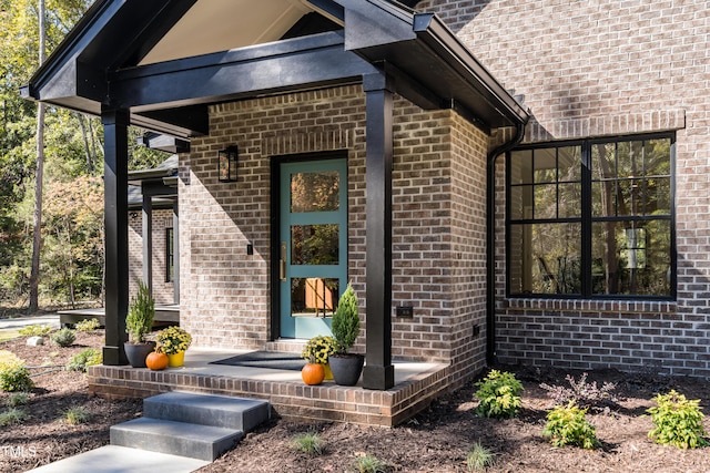 1414 Whippoorwill Ln, Chapel Hill, NC 27517 - doorway to property featuring brick siding