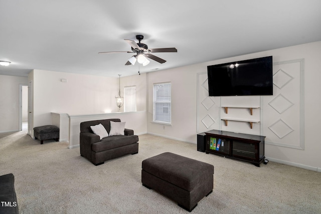 living room featuring light carpet and ceiling fan