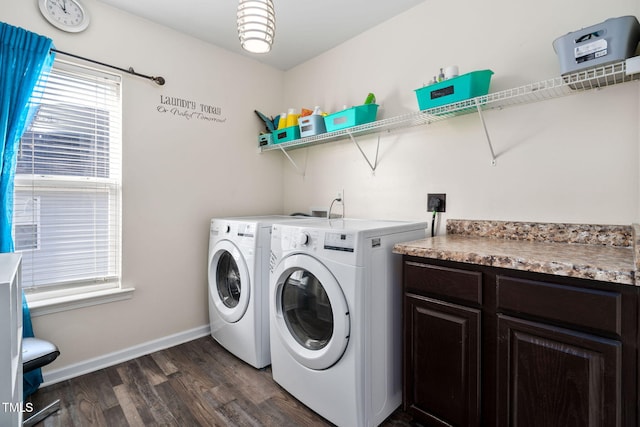 laundry room featuring dark hardwood / wood-style flooring and independent washer and dryer