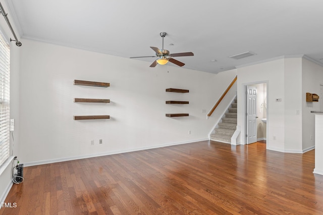 unfurnished living room featuring crown molding, hardwood / wood-style flooring, and ceiling fan