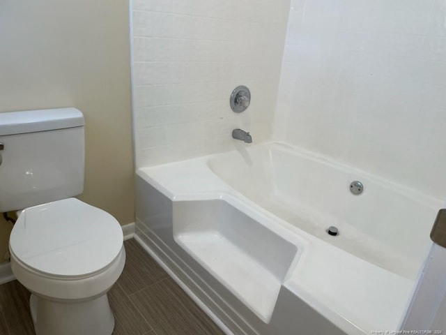 bathroom featuring toilet