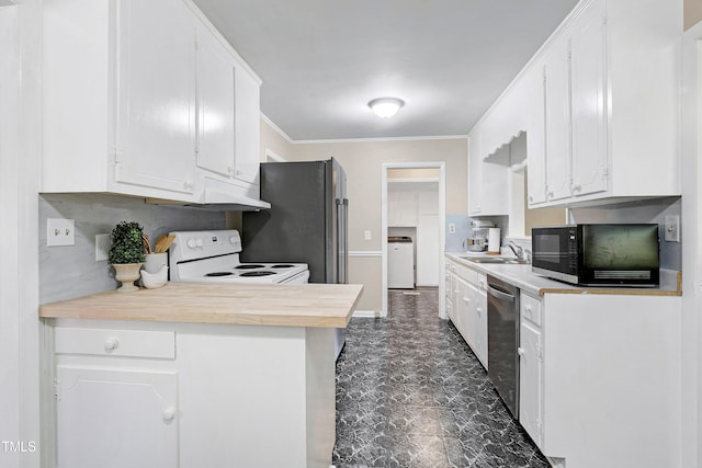 kitchen with white cabinetry, sink, refrigerator, washer / dryer, and electric range