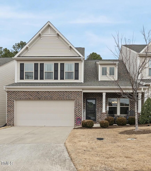 view of front of property with a garage