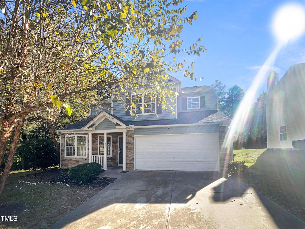 view of front of property with a garage