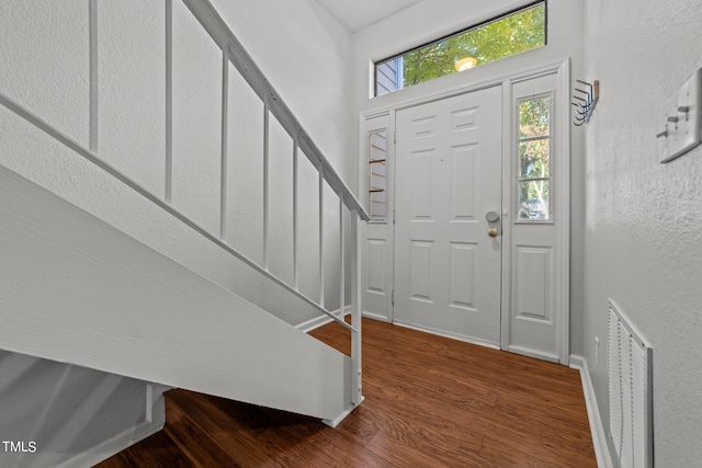 entrance foyer with hardwood / wood-style floors