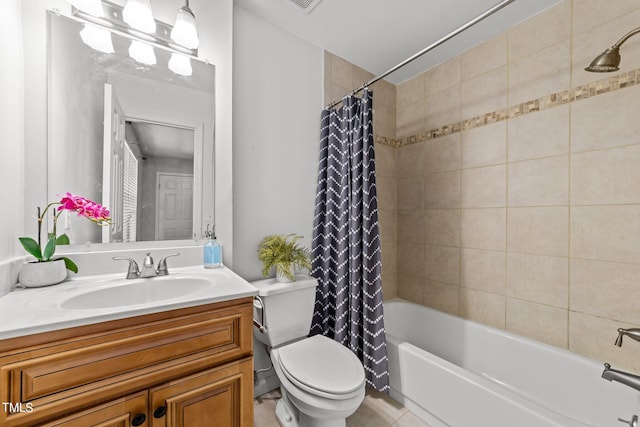 full bathroom with toilet, shower / bath combo, vanity, and tile patterned floors