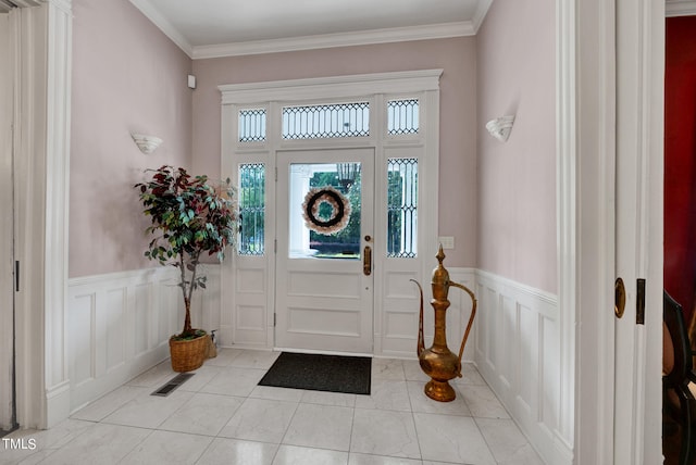 entryway with crown molding