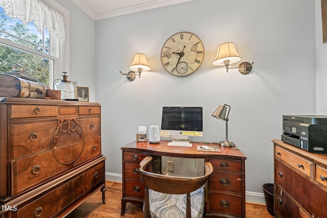 home office featuring crown molding and hardwood / wood-style floors